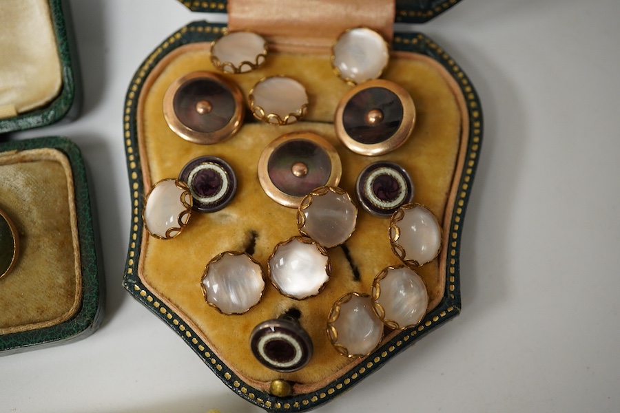 Two sets of 6 Edwardian agate dress studs, three enamelled dress studs, a set of 10 small mother of pearl buttons and three mother of pearl studs. Condition - one gold metal centre to green agate boxed set missing